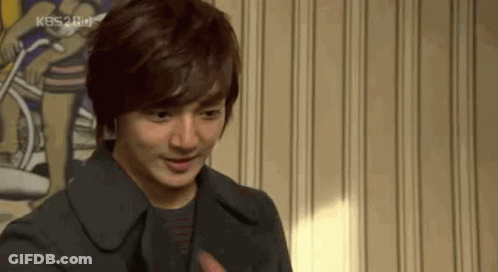 A Close Up Of A Man 'S Face With The Kbs2 Hd Logo On The Bottom Right GIF
