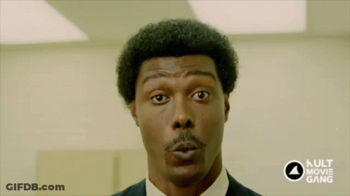 A Close Up Of A Man 'S Face With The Kult Movie Gang Logo In The Corner GIF