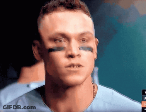 A Close Up Of A Man 'S Face With The Letter N On The Bottom Left GIF