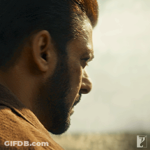 A Close Up Of A Man 'S Face With The Letter P On The Bottom GIF