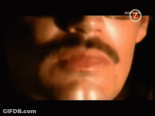 A Close Up Of A Man 'S Face With The Letter Z Visible GIF