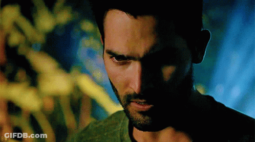 A Close Up Of A Man 'S Face With The Letters Bw On The Bottom Left GIF