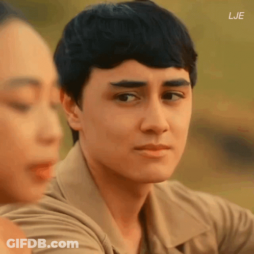 A Close Up Of A Man 'S Face With The Letters Lje On The Bottom Right GIF