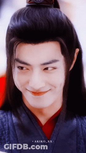 A Close Up Of A Man 'S Face With The Name Akiko_xx On The Bottom Right GIF