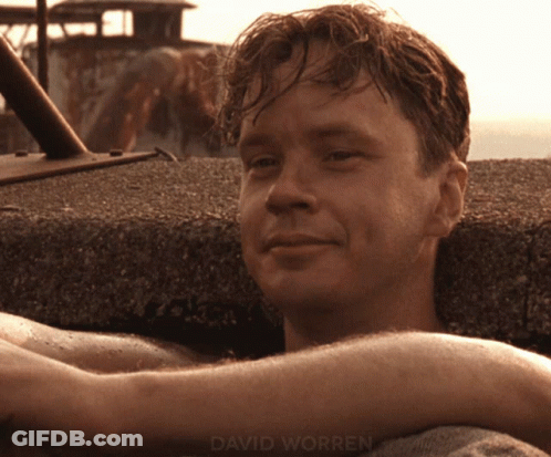 A Close Up Of A Man 'S Face With The Name David Worren On The Bottom Right GIF