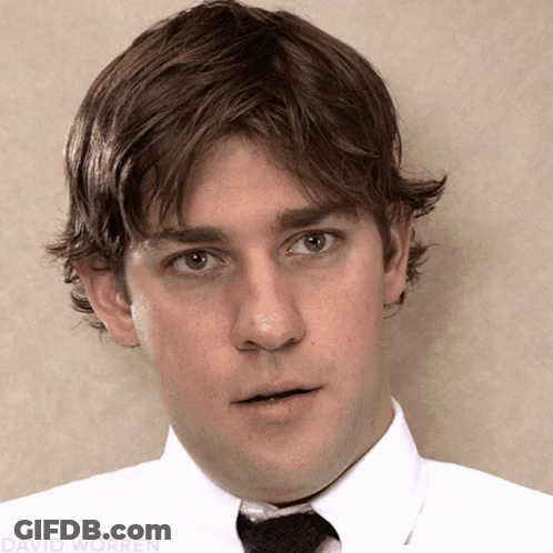 A Close Up Of A Man 'S Face With The Name David Worren Visible GIF