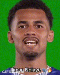 A Close Up Of A Man 'S Face With The Name Ilman Ndaye On The Bottom GIF