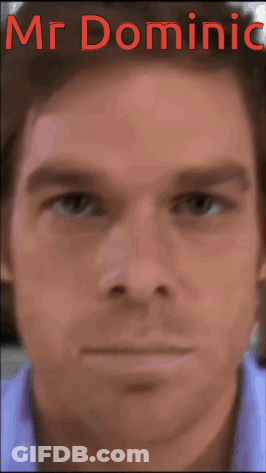 A Close Up Of A Man 'S Face With The Name Mr. Dominic Written In Red GIF