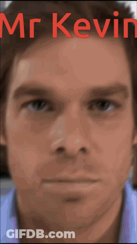 A Close Up Of A Man 'S Face With The Name Mr Kevin Written Above It GIF