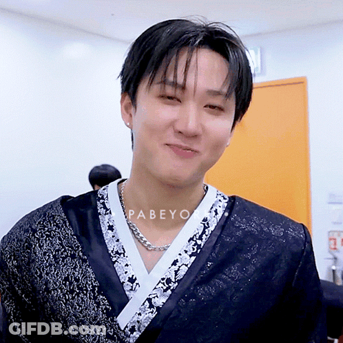 A Close Up Of A Man 'S Face With The Name Pabeyo Written On His Neck GIF