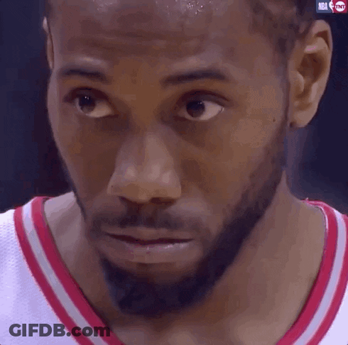 A Close Up Of A Man 'S Face With The Nba Logo Visible GIF