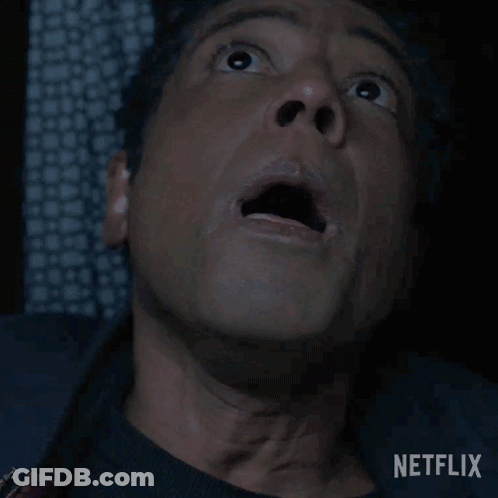 A Close Up Of A Man 'S Face With The Netflix Logo In The Corner GIF