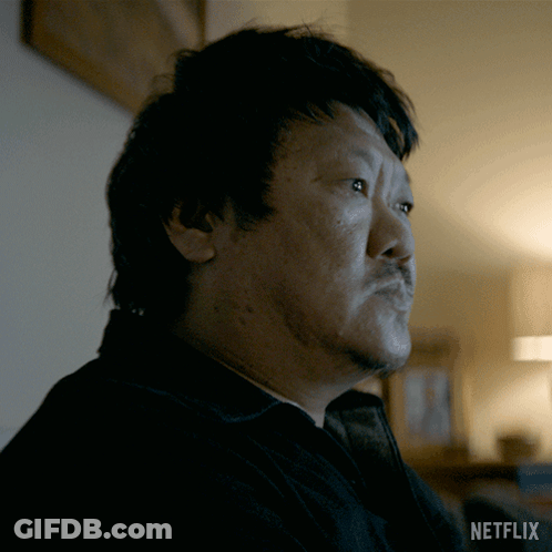 Close Up Of Man's Face With Netflix Logo GIF