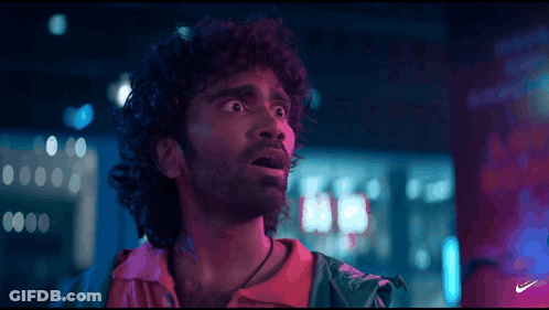 A Close Up Of A Man 'S Face With The Nike Logo In The Corner GIF