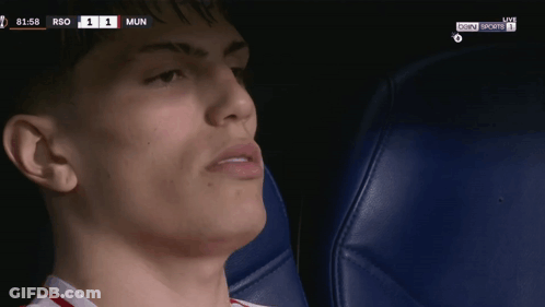 A Close Up Of A Man 'S Face With The Score Of 1 To 1 GIF