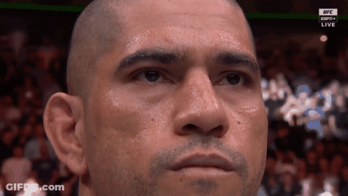 A Close Up Of A Man 'S Face With The Ufc Logo On The Bottom Right GIF