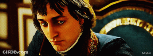 A Close Up Of A Man 'S Face With The Watermark Miyku On The Bottom Left GIF