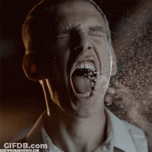 A Close Up Of A Man 'S Face With The Website Deathfromabove1979.com Written On The Bottom GIF