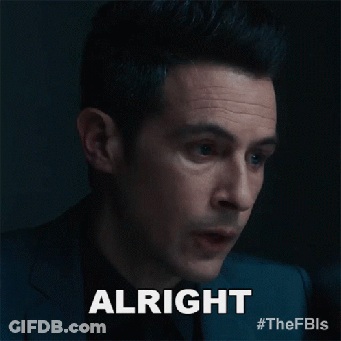 A Close Up Of A Man 'S Face With The Word Alright In White Letters GIF