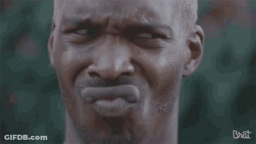 A Close Up Of A Man 'S Face With The Word Brat Written On The Bottom GIF