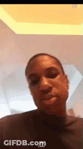 A Close Up Of A Man 'S Face With The Word Chat On The Bottom Right Corner GIF