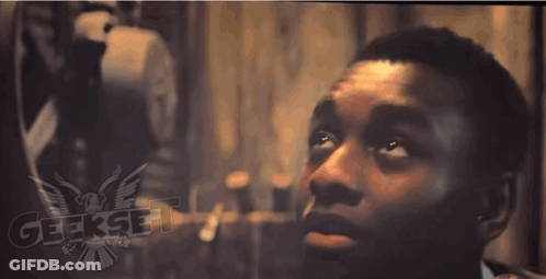A Close Up Of A Man 'S Face With The Word Geekset On The Bottom Right GIF