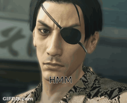A Close Up Of A Man 'S Face With The Word Hmm Written On It GIF