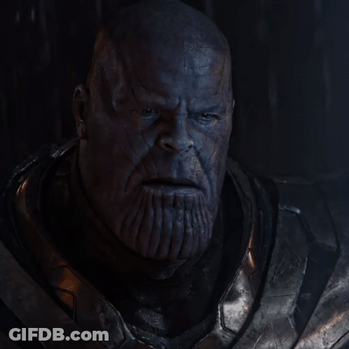 A Close Up Of A Man 'S Face With The Word Impossible Above It GIF