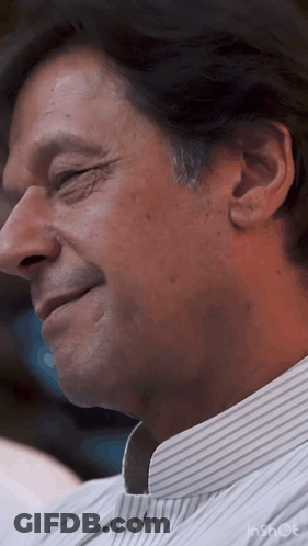 A Close Up Of A Man 'S Face With The Word Inshot Visible GIF