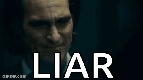 A Close Up Of A Man 'S Face With The Word Liar Written On It . GIF