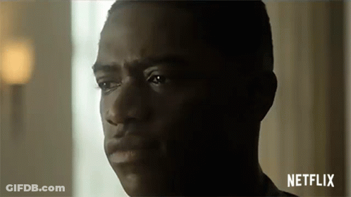 A Close Up Of A Man 'S Face With The Word Netflix On The Bottom Right . GIF
