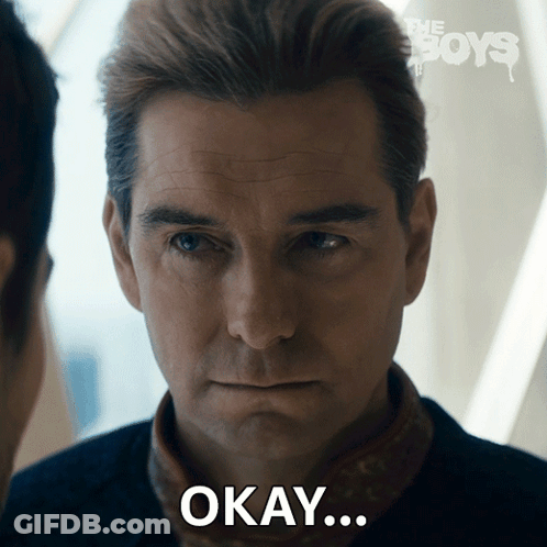 A Close Up Of A Man 'S Face With The Word Okay On It GIF
