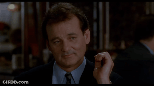 A Close Up Of A Man 'S Face With The Word Oui In The Corner GIF
