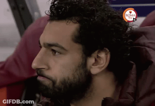 A Close Up Of A Man 'S Face With The Word Roma Tv On The Bottom GIF