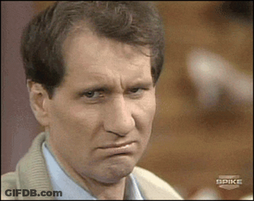 Close Up Of Man's Face With Spike Text GIF