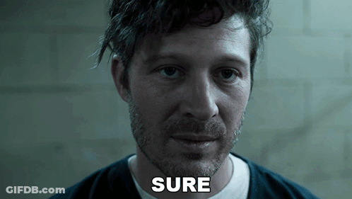 A Close Up Of A Man 'S Face With The Word Sure Visible GIF