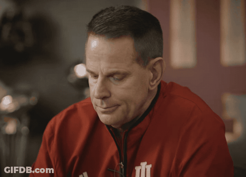 A Close Up Of A Man 'S Face With The Word Winning Above Him GIF