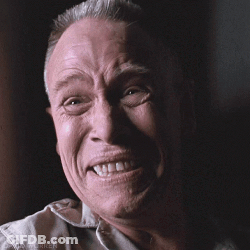 A Close Up Of A Man 'S Face With The Word Worren On The Bottom Left GIF