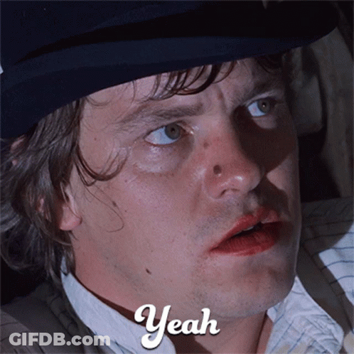 A Close Up Of A Man 'S Face With The Word Yeah Written On The Bottom GIF