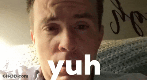 A Close Up Of A Man 'S Face With The Word Yuh Written Below It GIF