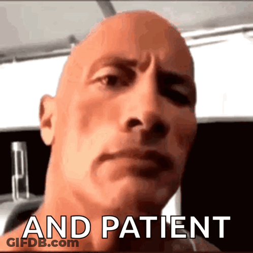 A Close Up Of A Man 'S Face With The Words " And Patient " Written Below It GIF