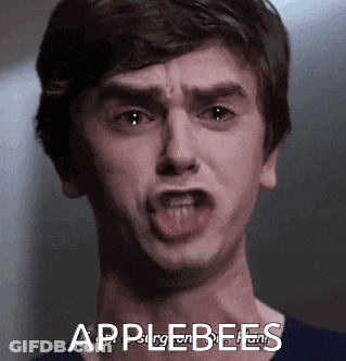 A Close Up Of A Man 'S Face With The Words Applebees In The Corner GIF
