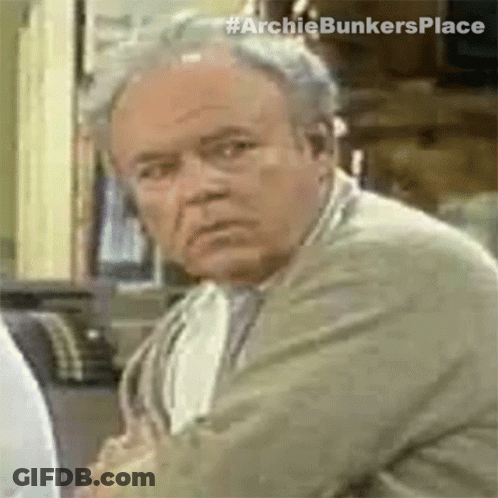 Close Up Of Man's Face With Archiebunkersplace Text GIF