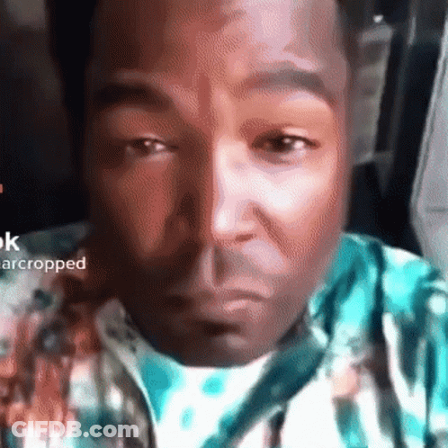 A Close Up Of A Man 'S Face With The Words " Arcropped " In The Corner GIF