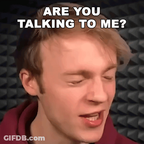 A Close Up Of A Man 'S Face With The Words Are You Talking To Me Written Above Him GIF