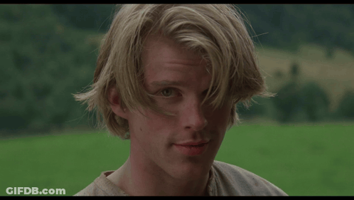 A Close Up Of A Man 'S Face With The Words " As You Wish " Above Him GIF