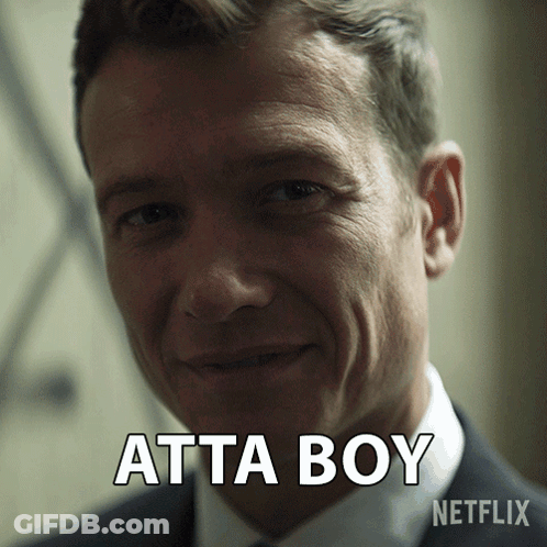 A Close Up Of A Man 'S Face With The Words Atta Boy Above Him GIF