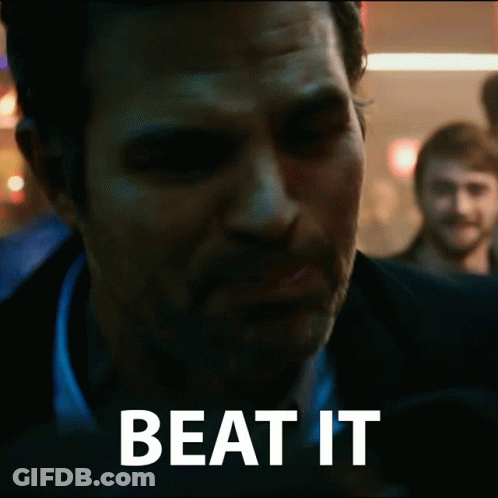 A Close Up Of A Man 'S Face With The Words Beat It Written On The Bottom GIF