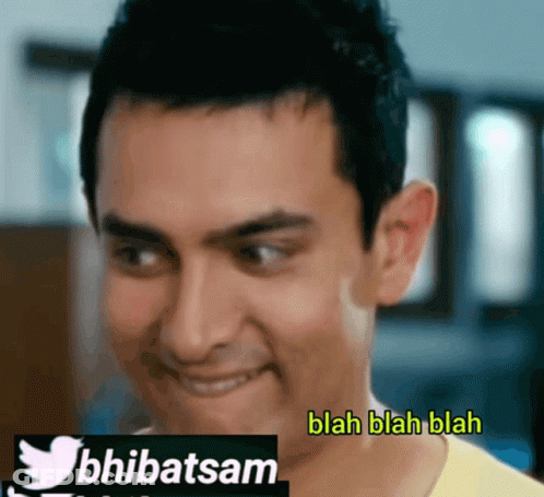 A Close Up Of A Man 'S Face With The Words Blah Blah Blah Below It GIF