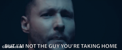 A Close Up Of A Man 'S Face With The Words But I 'M Not The Guy You 'Re Taking Home Above Him GIF